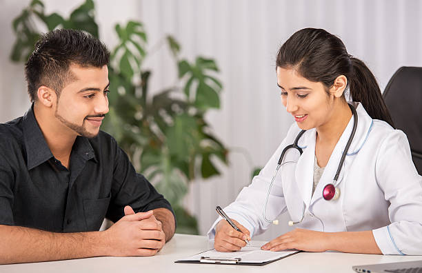 Doctor consulting a patient and creating personalized healthcare plan at ABRO Clinics Dubai