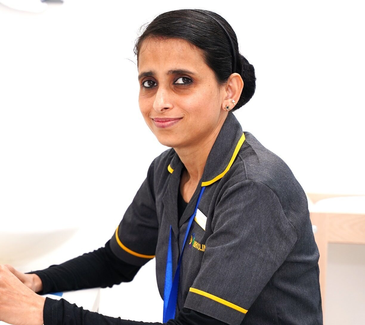 Sree Jamol staff nurse providing patient care at clinic in Dubai