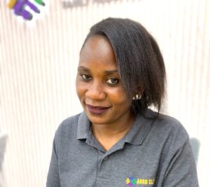 Race Anyango clinic support staff member in Dubai healthcare facility